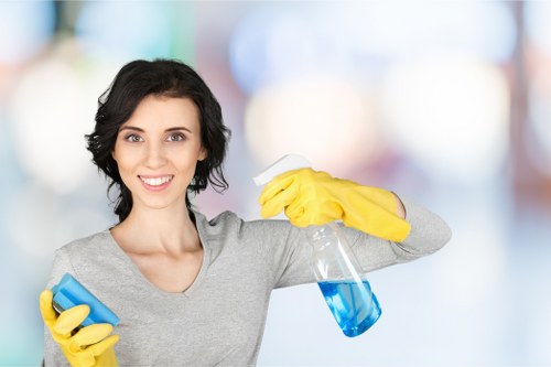 Carpet cleaning team preparing equipment with safety precautions