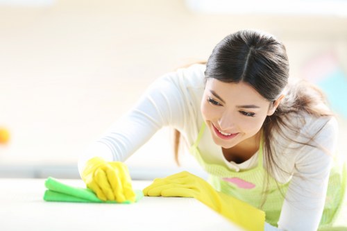 Deep cleaning a cushioned armchair for upholstery maintenance in Orpington